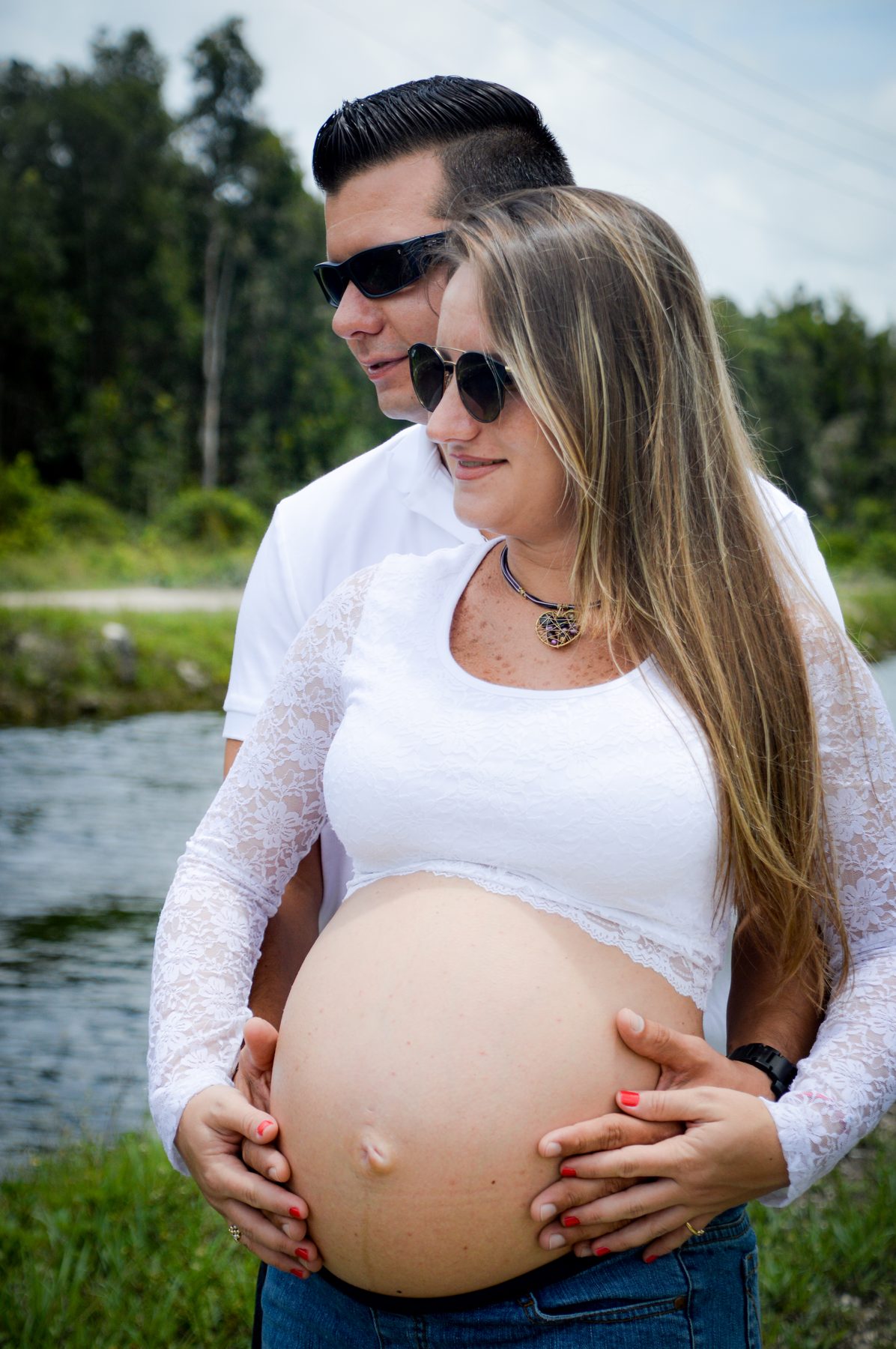 Maternity portrait of a couple outdoors — West Palm Beach family photography by Concha Solutions