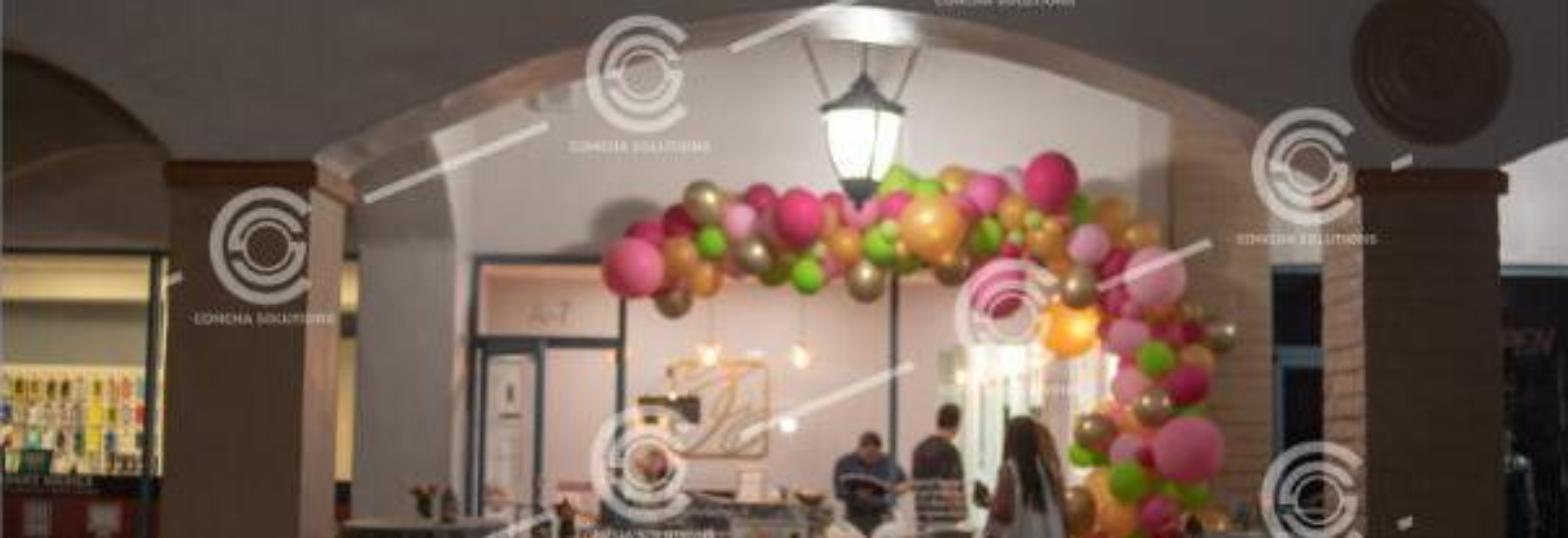 Grand opening event with balloon arch, Palm Beach County storefront
