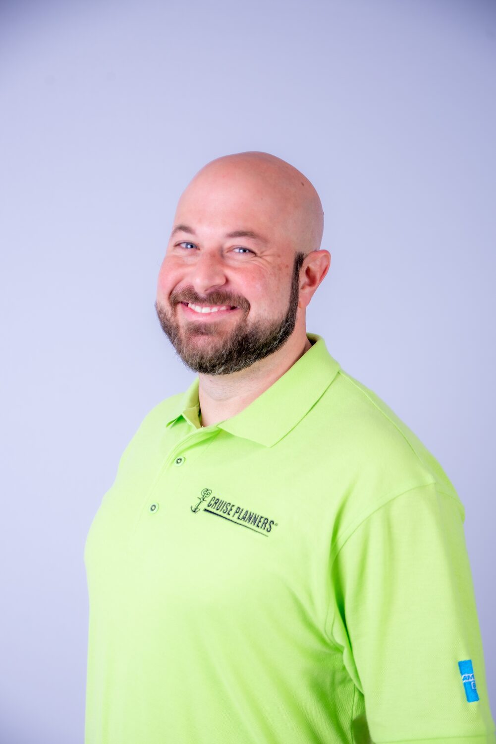 Approachable headshot in branded polo, profile view — West Palm Beach headshot photography by Concha Solutions