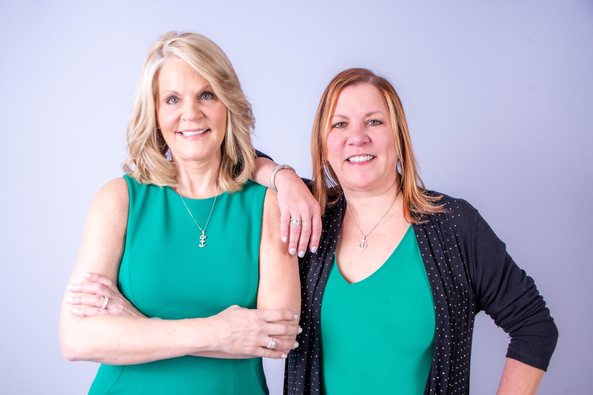 Team portrait, two colleagues smiling together — West Palm Beach headshot photography by Concha Solutions