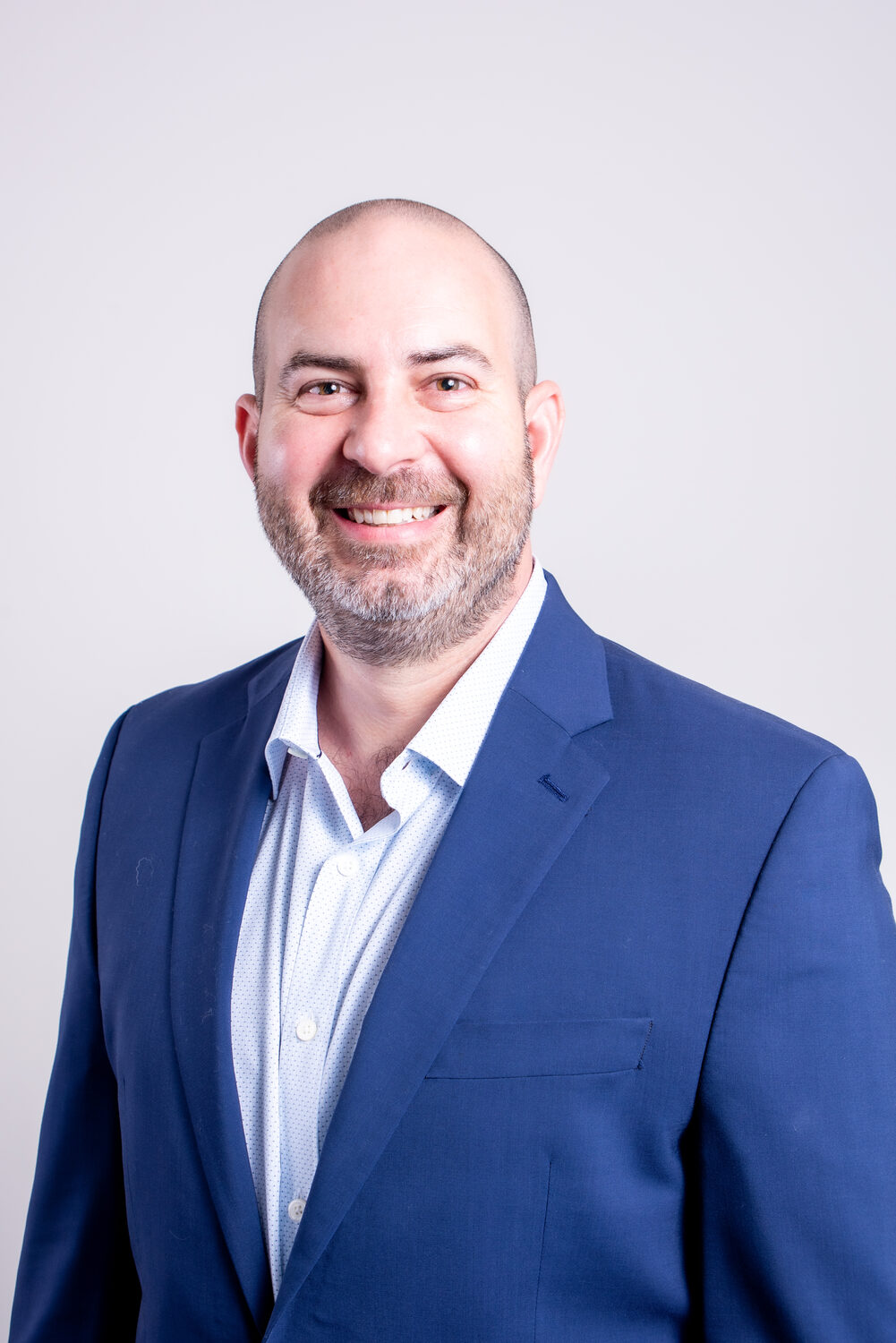 Professional headshot with warm studio lighting — West Palm Beach headshot photography by Concha Solutions
