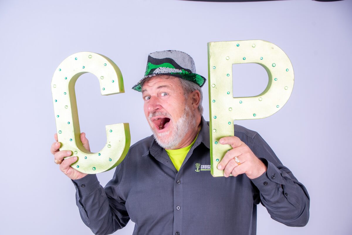 Playful team portrait with branded marquee letters — West Palm Beach headshot photography by Concha Solutions